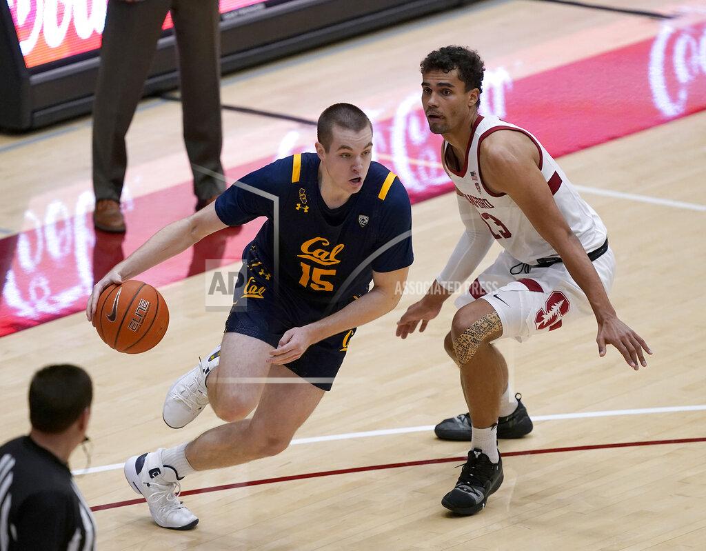 Tony Avelar California forward Grant Anticevich (15) drives past Stanford forward Oscar da Silva (13) during the second half of an NCAA college basketball game in Stanford, Calif., Sunday, Feb. 7, 2021. (AP Photo/Tony Avelar)