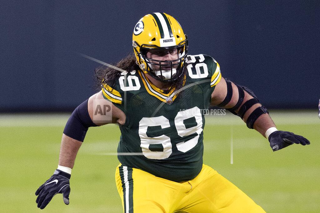 Jeffrey Phelps FILE - Green Bay Packers offensive tackle David Bakhtiari (69) plays during an NFL football game against the Chicago Bears in Green Bay, Wisc., in this Sunday, Nov 29. 2020, file photo. Bakhtiari was selected Friday, Jan. 8, 2021, to The Associated Press All-Pro Team. (AP Photo/Jeffrey Phelps, File)