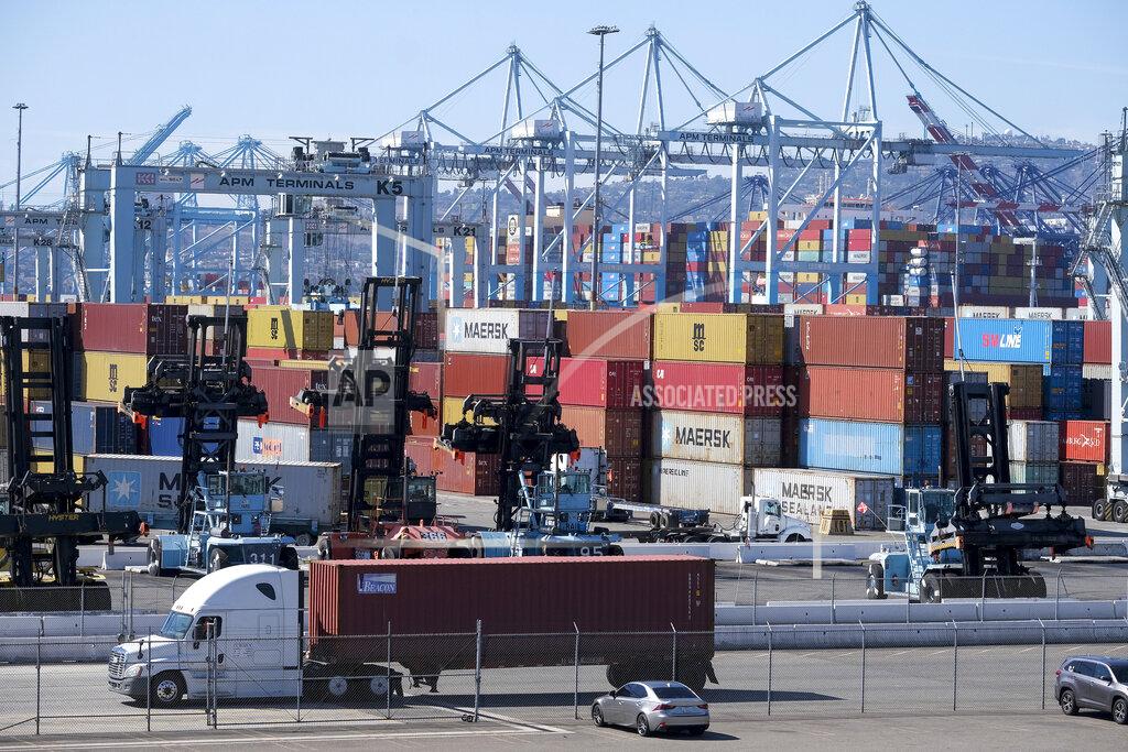 Ringo H.W. Chiu Cargo containers sit stacked at the Port of Los Angeles, Wednesday, Oct. 20, 2021 in San Pedro, Calif. California Gov. Gavin Newsom on Wednesday issued an order that aims to ease bottlenecks at the ports of Los Angeles and Long Beach that have spilled over into neighborhoods where cargo trucks are clogging residential streets. (AP Photo/Ringo H.W. Chiu)