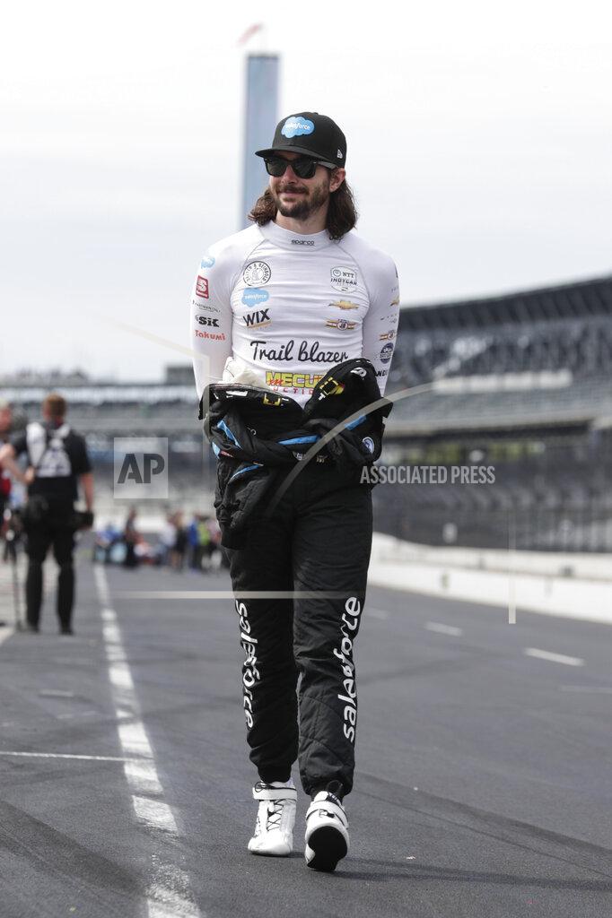 Michael Conroy JR Hildebrand walks through the pit area before the start of practice for the Indianapolis 500 IndyCar auto race at Indianapolis Motor Speedway, Friday, May 17, 2019 in Indianapolis. (AP Photo/Michael Conroy)