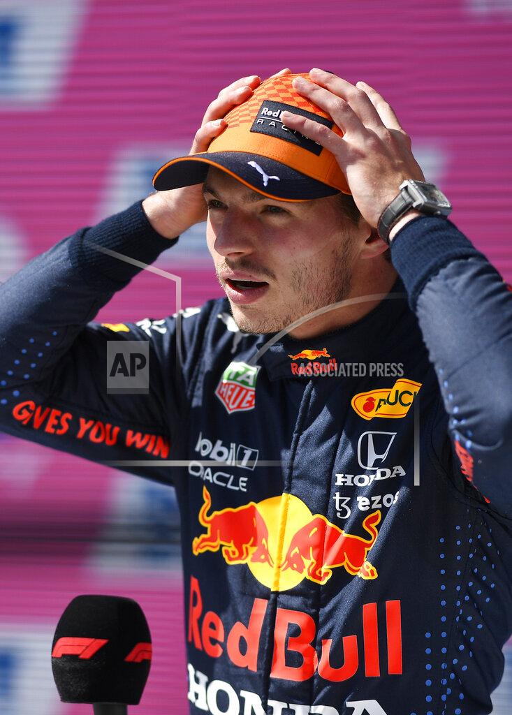 Christian Bruna Red Bull driver Max Verstappen of the Netherlands after taking pole position during the qualifying session ahead of the Austrian Formula One Grand Prix at the Red Bull Ring racetrack in Spielberg, Austria, Saturday, July 3, 2021. The Austrian Grand Prix will be held on Sunday. (Christian Bruna/Pool Photo via AP)