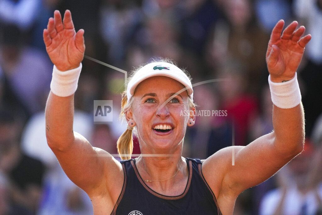 Michel Euler Switzerland's Jil Teichmann celebrates winning her third round match against Victoria Azarenka of Belarus at the French Open tennis tournament in Roland Garros stadium in Paris, France, Friday, May 27, 2022. (AP Photo/Michel Euler)