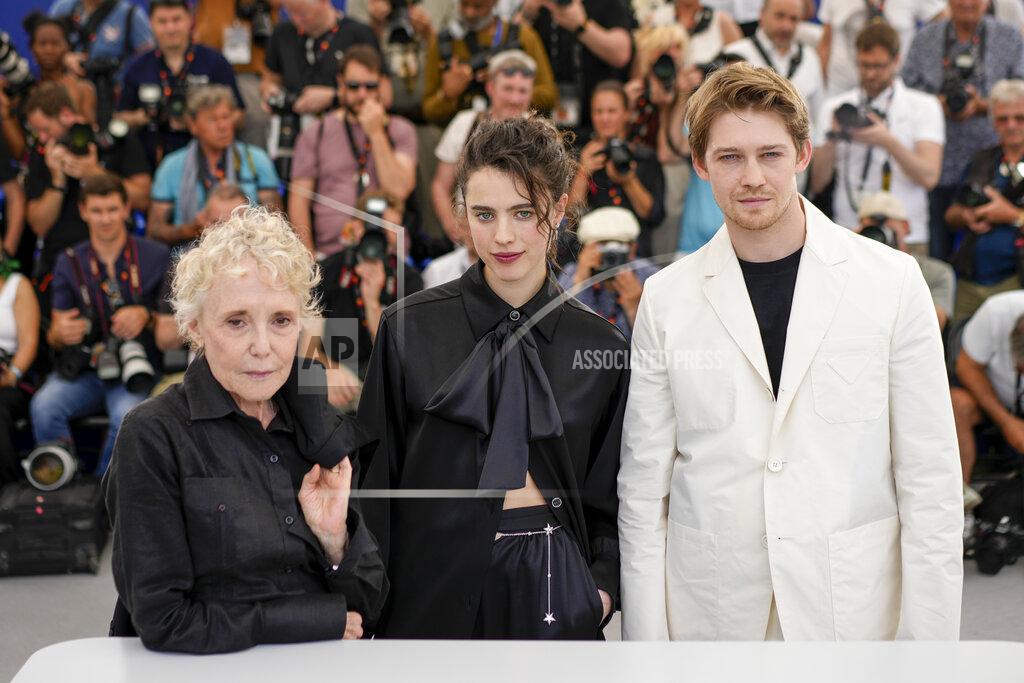 Daniel Cole Director Claire Denis, from left, Margaret Qualley and Joe Alwyn pose for photographers at the photo call for the film 'Stars at Noon' at the 75th international film festival, Cannes, southern France, Thursday, May 26, 2022. (AP Photo/Daniel Cole)