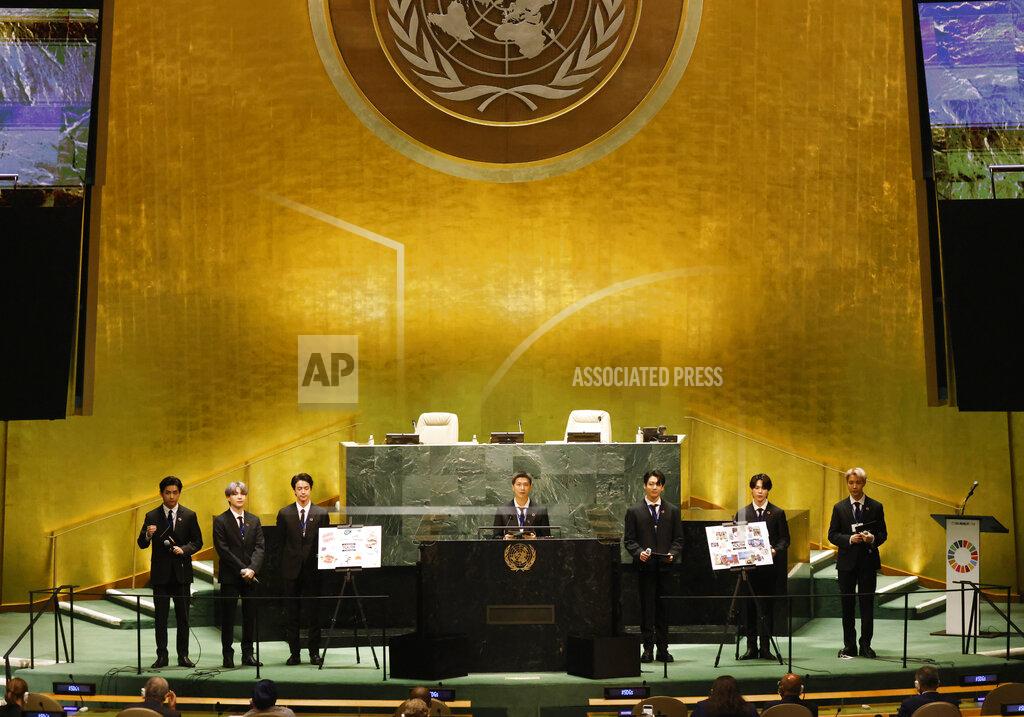 John Angelillo ADDS IDS - Members of South Korean K-pop band BTS, from left, V, Suga, Jin, RM, Jung Kook, Jimin and J-Hope appear at the United Nations meeting on Sustainable Development Goals during the 76th session of the U.N. General Assembly at U.N. headquarters on Monday, Sept. 20, 2021. (John Angelillo/Pool Photo via AP)