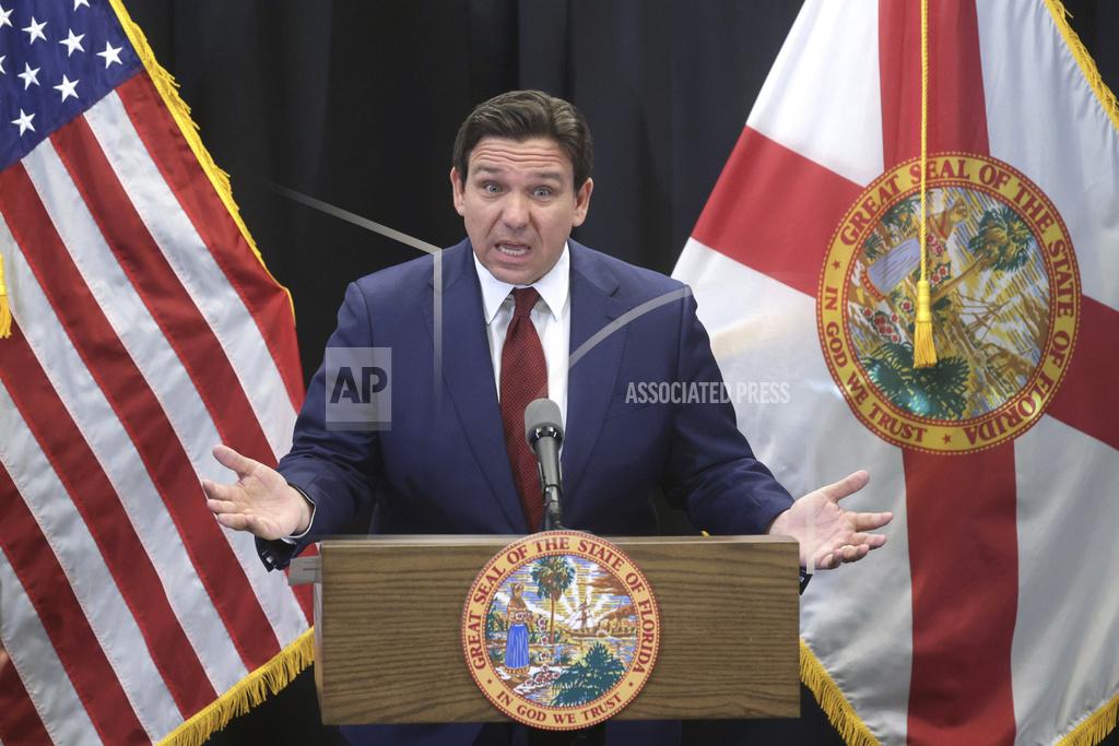 FILE - Florida Gov. Ron DeSantis delivers remarks during a press conference at the Central Florida Tourism Oversight District headquarters at Walt Disney World, in Lake Buena Vista, Fla., Thursday, Feb. 22, 2024.  The University of Florida is eliminating its chief diversity officer position, Friday, March 1, scrapping the program’s staff jobs and halting any contracts involving the subject because of a new law passed last year by the Republican-dominated state Legislature.  (Joe Burbank/Orlando Sentinel via AP, File)