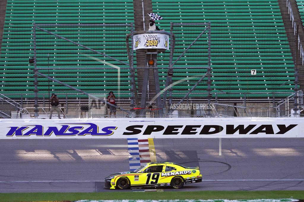 Charlie Riedel Brandon Jones takes the checkered flag as he wins a NASCAR Xfinity Series auto race at Kansas Speedway in Kansas City, Kan., Saturday, July 25, 2020. (AP Photo/Charlie Riedel)