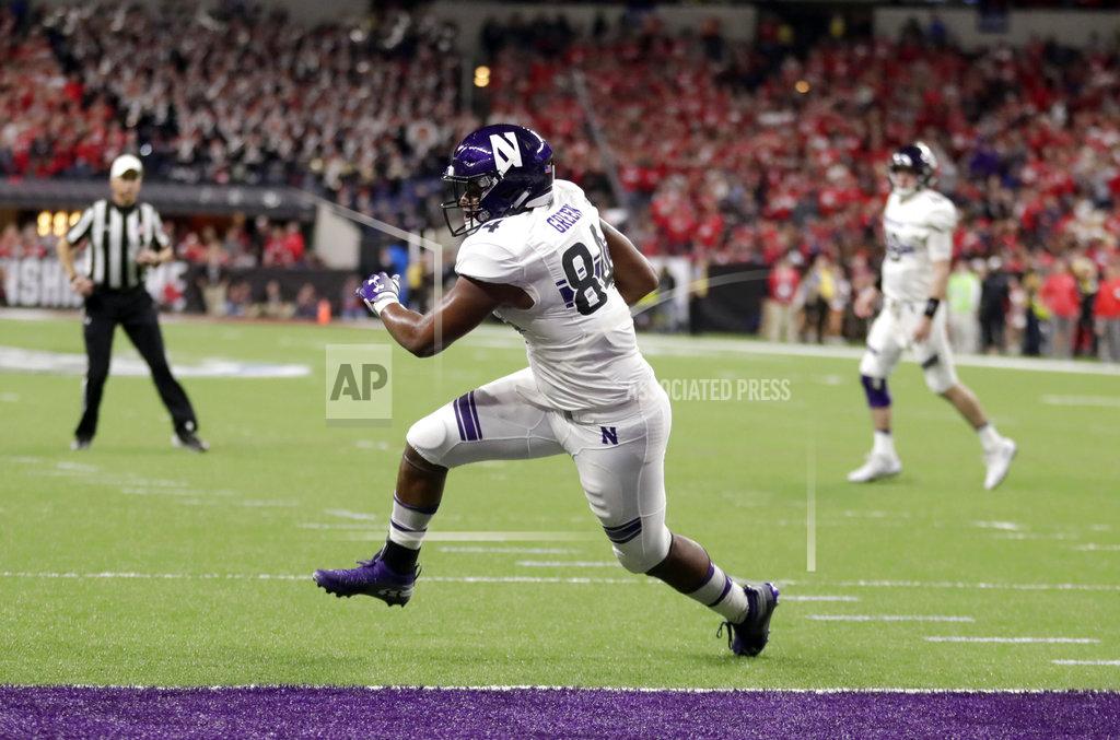 Michael Conroy Northwestern wide receiver Cameron Green (84) goes in for a touchdown during the second half of the Big Ten championship NCAA college football game against Ohio State, Saturday, Dec. 1, 2018, in Indianapolis. (AP Photo/Michael Conroy)