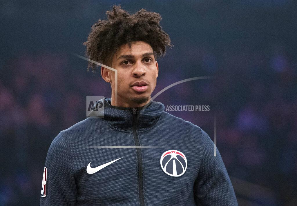 Mary Altaffer FILE - In this Sunday, April 7, 2019, file photo, Washington Wizards forward Devin Robinson warms up before an NBA basketball game against the New York Knicks at Madison Square Garden in New York. Police said Saturday, April 13, 2019, Philadelphia Eagles cornerback Jalen Mills and Washington Wizards forward Devin Robinson were arrested after a fight near a club in Washington. (AP Photo/Mary Altaffer, File)