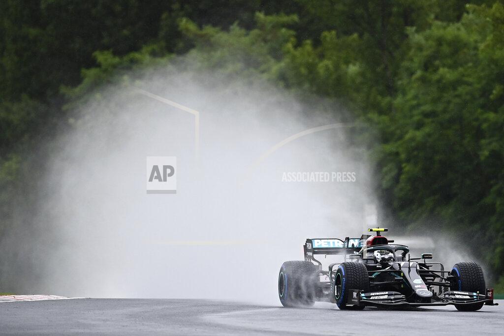 Joe Klamar Mercedes driver Valtteri Bottas of Finland steers his car during the second practice session for the Hungarian Formula One Grand Prix at the Hungaroring racetrack in Mogyorod, Hungary, Friday, July 17, 2020. The Hungarian F1 Grand Prix will be held on Sunday. (Joe Klamar/Pool via AP)