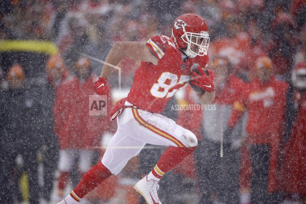 Charlie Riedel Kansas City Chiefs tight end Travis Kelce (87) carries the ball during the first half of an NFL football game against the Denver Broncos in Kansas City, Mo., Sunday, Dec. 15, 2019. (AP Photo/Charlie Riedel)