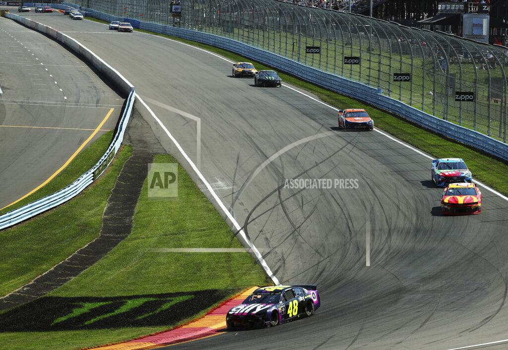 John Munson Jimmie Johnson heads into Turn 1 during a NASCAR Cup Series auto race at Watkins Glen International, Sunday, Aug. 4, 2019, in Watkins Glen, N.Y. (AP Photo/John Munson)