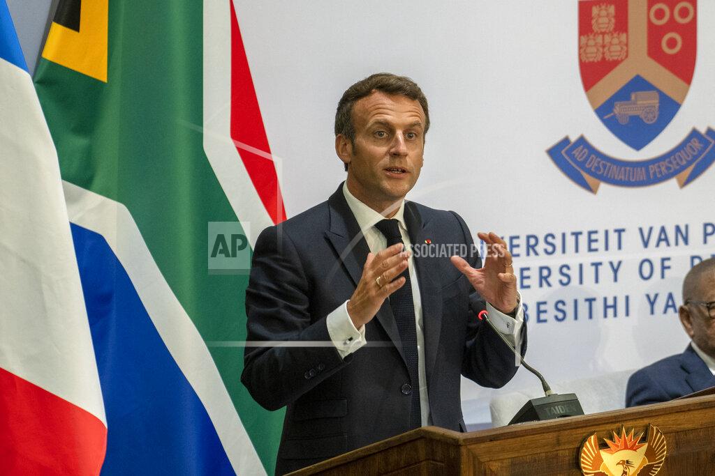 Jerome Delay French President Emmanuel Macron delivers a speech at the University of Pretoria Future Africa in Pretoria, South Africa, Friday May 28, 2021. Macron and South African President Cyril Ramaphosa are launching a program to support African vaccine production, a project backed by the European Union, the United States and the World Bank. (AP Photo/Jerome Delay)