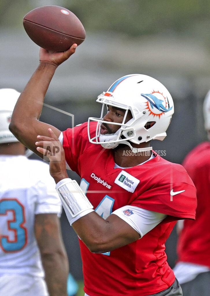 David Santiago Miami Dolphins quarterback Jacoby Brissett (14) throws during NFL football practice at Baptist Health Training Complex in Hard Rock Stadium on Thursday, Oct. 7, 2021, in Miami Gardens, Fla. The Dolphins play the Tampa Bay Buccaneers on Sunday in Tampa. (David Santiago/Miami Herald via AP)