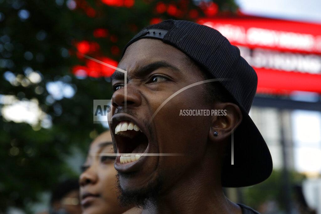 Brynn Anderson Demonstrators protest, Saturday, May 30, 2020 in Atlanta. (AP Photo/Brynn Anderson)