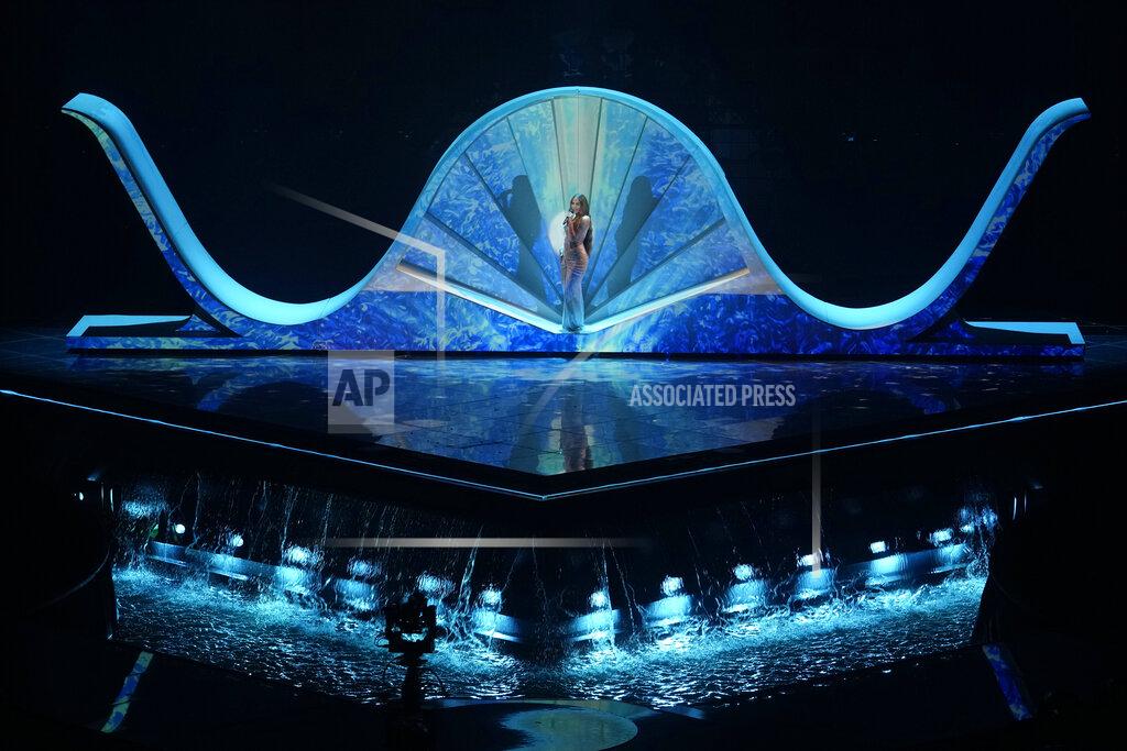 Luca Bruno Andromache from Cyprus singing 'Ela' performs during the second semi final at the Eurovision Song Contest in Turin, Italy, Thursday, May 12, 2022. (AP Photo/Luca Bruno)