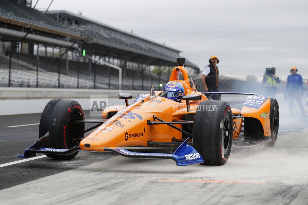Michael Conroy FILE - In this April 24, 2019, file photo, IndyCar driver Fernando Alonso, of Spain, drives out of the pit area during testing at the Indianapolis Motor Speedway in Indianapolis. Alonso feels far better about his chances to close out motorsports' version of the Triple Crown this year. The Spaniard will race for Arrow McLaren SP in the Indianapolis 500 and believes the organization is prepared. (AP Photo/Michael Conroy, File)