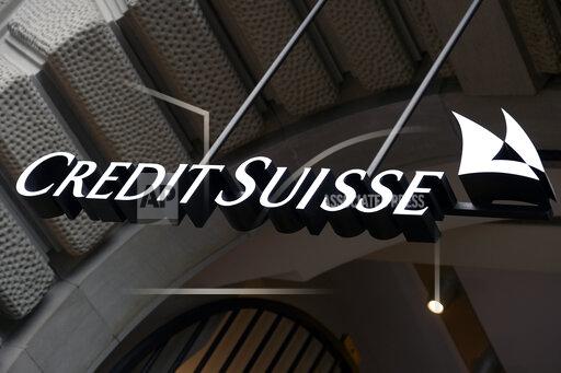 FILE - This Oct. 21, 2015 file photo shows the logo of the Swiss bank Credit Suisse, in Zurich, Switzerland. Credit Suisse has announced on Wednesday, Oct. 20, 2021 settlements totaling nearly $700 million with British, Swiss and U.S. authorities over lending to Mozambique state-owned companies that Swiss regulators say violated anti-money-laundering rules. The Zurich-based bank, Switzerland’s second-largest, also was required by the Swiss financial markets authority to improve its risk controls. (Walter Bieri/Keystone via AP, file)