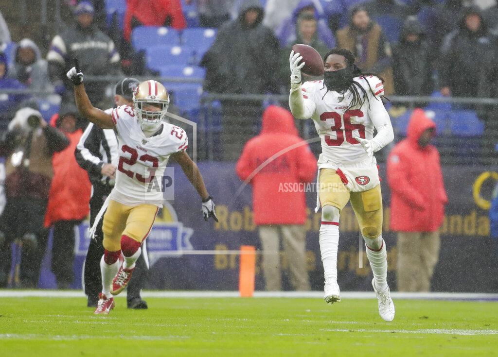 Julio Cortez San Francisco 49ers defensive back Marcell Harris (36) runs after to recovering the ball from Baltimore Ravens quarterback Lamar Jackson who fumble it in the second half of an NFL football game, Sunday, Dec. 1, 2019, in Baltimore, Md. With Harris is teammate cornerback Ahkello Witherspoon (23). (AP Photo/Julio Cortez)