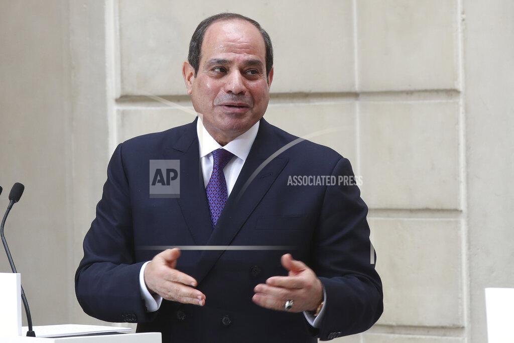 Michel Euler FILE - In this Dec. 7, 2020, file photo, Egyptian President Abdel-Fattah el-Sissi speaks during a joint press conference with French President Emmanuel Macron at the Elysee palace, in Paris. Egypt’s president met Tuesday, Sept. 14, 2021, with Libya’s parliament speaker and a powerful military commander as Cairo pushes for the withdrawal of foreign forces and mercenaries and the holding of elections as scheduled in December. (AP Photo/Michel Euler, Pool, File)