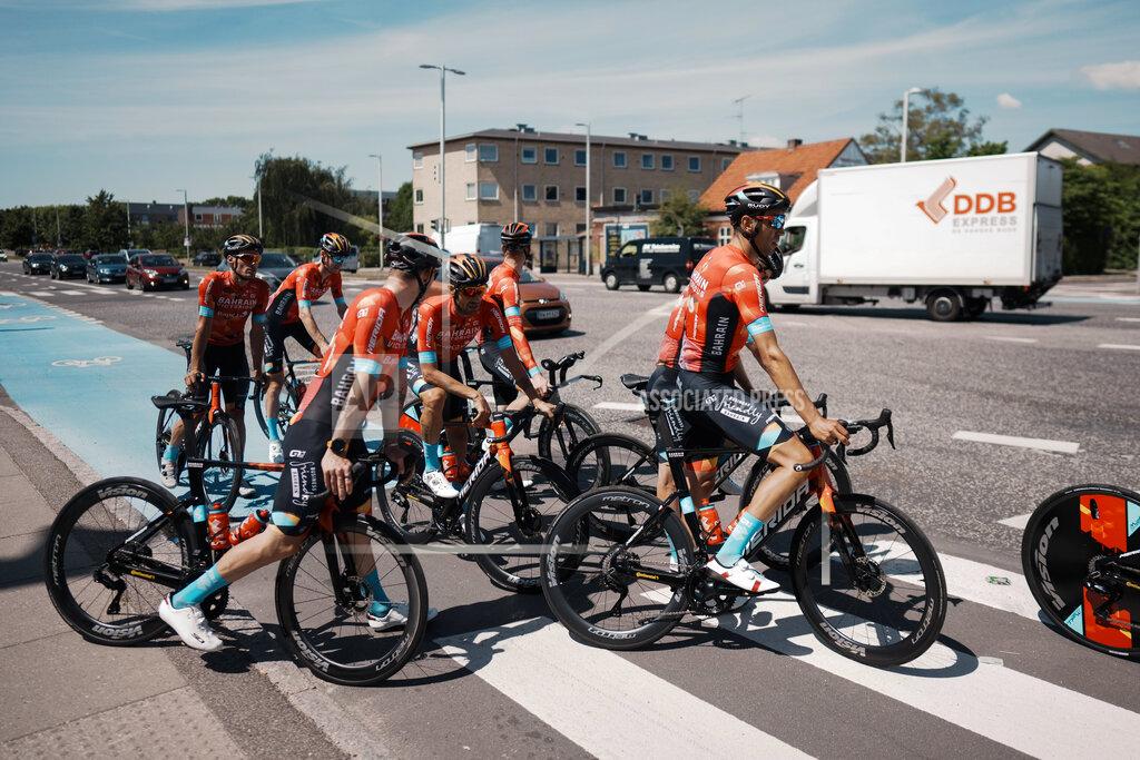 Thibault Camus Team Bahrain Victorious riders return after a training near Copenhagen, Denmark, Thursday, June 30, 2022. Riders and staff from the Bahrain Victorious team had their homes searched by police before they left for Denmark and the team's hotel was searched by Danish police early in the morning in the ongoing investigation. The Tour de France cycling race starts on Friday, July 1, with the first stage, an individual time trial over 13.2 kilometers (8.2 miles) with start and finish in Copenhagen. (AP Photo/Thibault Camus)
