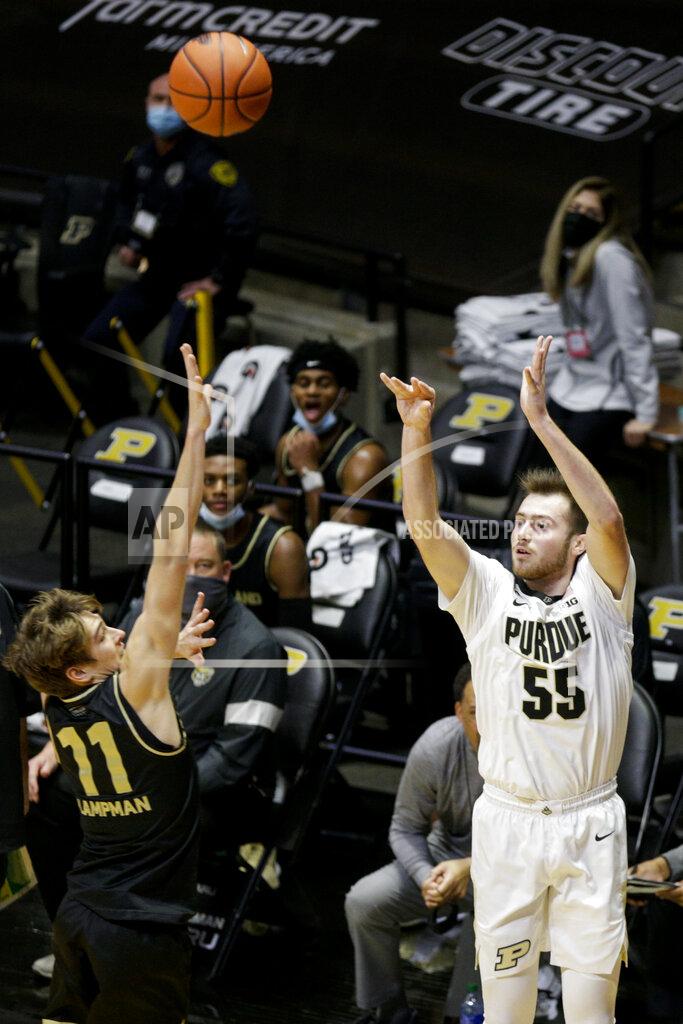 Nikos Frazier Purdue guard Sasha Stefanovic (55) goes up for three against Oakland guard Blake Lampman (11) during the first half of an NCAA college basketball game Tuesday, Dec. 1, 2020 in West Lafayette, Ind. (Nikos Frazier/Journal & Courier via AP)
