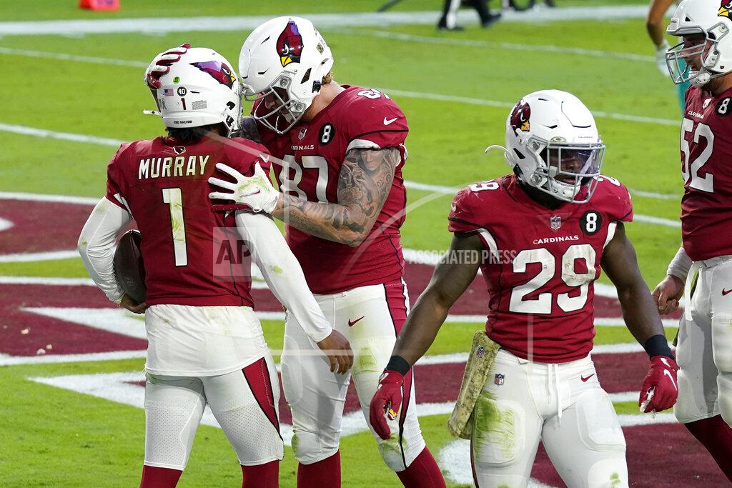 Ross D. Franklin Arizona Cardinals quarterback Kyler Murray (1) celebrates his rushing touchdown with tight end Maxx Williams (87) during the second half of an NFL football game against the Miami Dolphins, Sunday, Nov. 8, 2020, in Glendale, Ariz. (AP Photo/Ross D. Franklin)