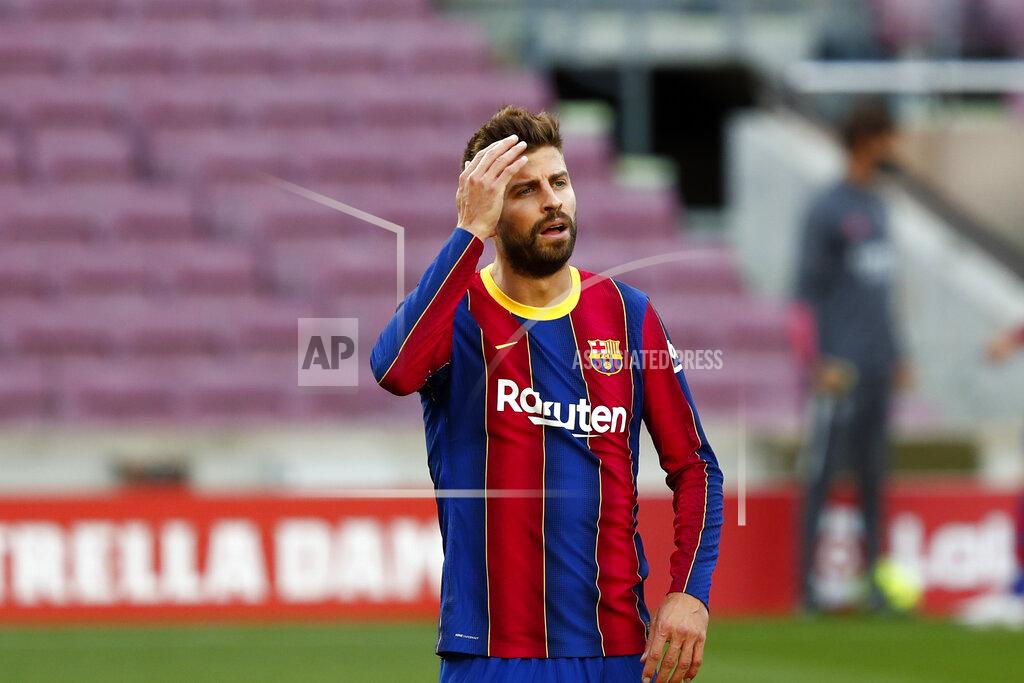 Joan Monfort Barcelona's Gerard Pique reacts during the Spanish La Liga soccer match between FC Barcelona and Real Madrid at the Camp Nou stadium in Barcelona, Spain, Saturday, Oct. 24, 2020. (AP Photo/Joan Monfort)