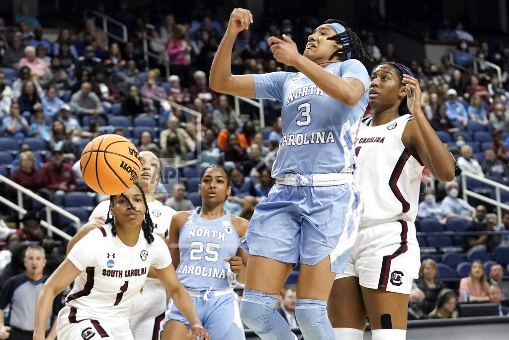 Gerry Broome North Carolina guard Kennedy Todd-Williams (3) loses the ball while South Carolina guard Zia Cooke (1) and forward Aliyah Boston, right, defend during the first half of a college basketball game in the Sweet 16 round of the NCAA tournament in in Greensboro, N.C., Friday, March 25, 2022. (AP Photo/Gerry Broome)