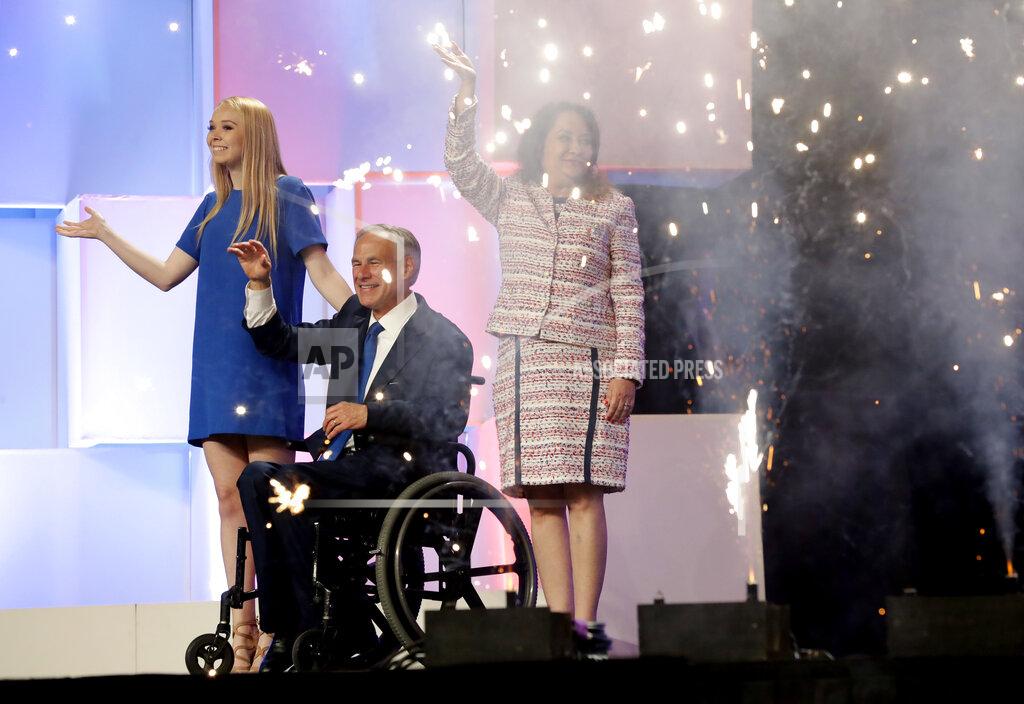 Eric Gay File - In this June 15, 2018 file photo, Texas Gov. Greg Abbott, center, with wife, Cecilia, right, and daughter, Audrey, at the Texas GOP Convention, in San Antonio. As the Texas GOP presses ahead with plans for a July convention amid a worsening coronavirus outbreak, the state's largest medical group Tuesday June 30, 2020, urged the party to reconsider before thousands of Republican activists flock to Houston, which has become one of the nation's most troubling hotspots. (AP Photo/Eric Gay File)