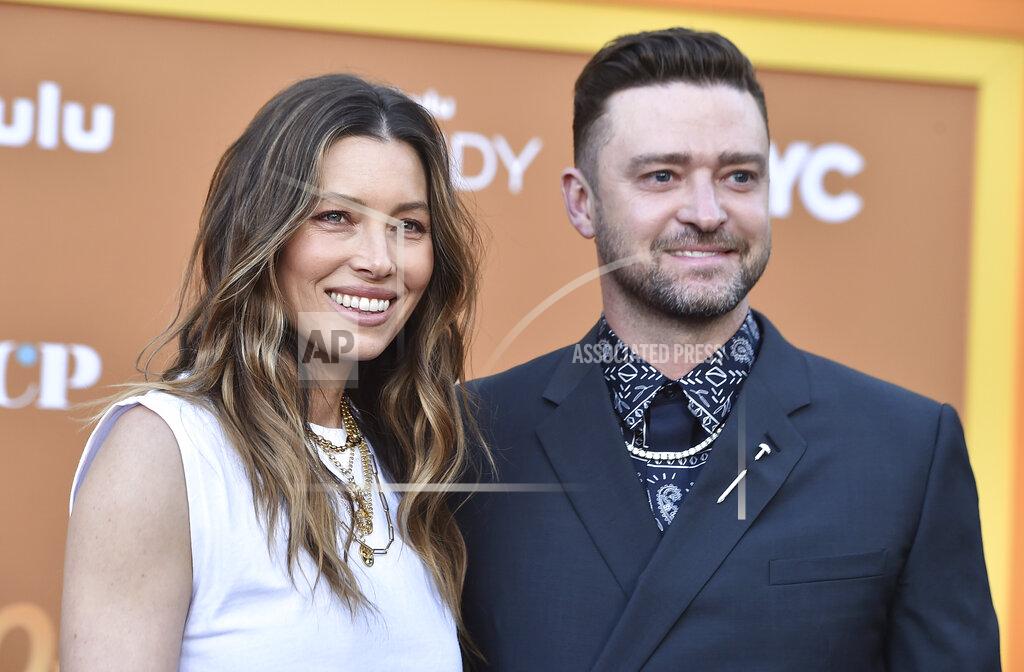 Jordan Strauss Cast member and executive producer Jessica Biel, left, arrives with her husband, Justin Timberlake, at the Los Angeles premiere of "Candy," on Monday, May 9, 2022 at El Capitan Theatre. (Photo by Jordan Strauss/Invision/AP)