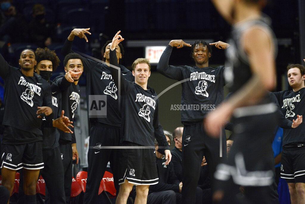 Paul Beaty The Providence bench celebrates after Jared Bynum made a three-point basket during the second half of an NCAA college basketball game against DePaul Saturday, Jan.1, 2022, in Chicago. Providence won 70-53. (AP Photo/Paul Beaty)