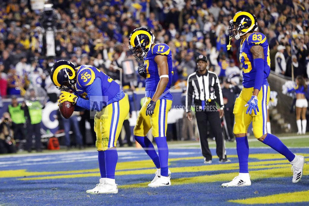 Marcio Jose Sanchez FILE - In this Jan. 12, 2019, file photo, Los Angeles Rams running back C.J. Anderson celebrates after scoring against the Dallas Cowboys during the first half of an NFL divisional football playoff game in Los Angeles. Elite quarterbacks aren't the only thing the four teams left in the playoffs have in common. The Rams, Patriots and Saints were among the top six in rushing. Anderson (123) and Todd Gurley (115) had big games as Los Angeles ran for 273 yards in a 30-22 win against Dallas in the divisional round. (AP Photo/Marcio Jose Sanchez, File)