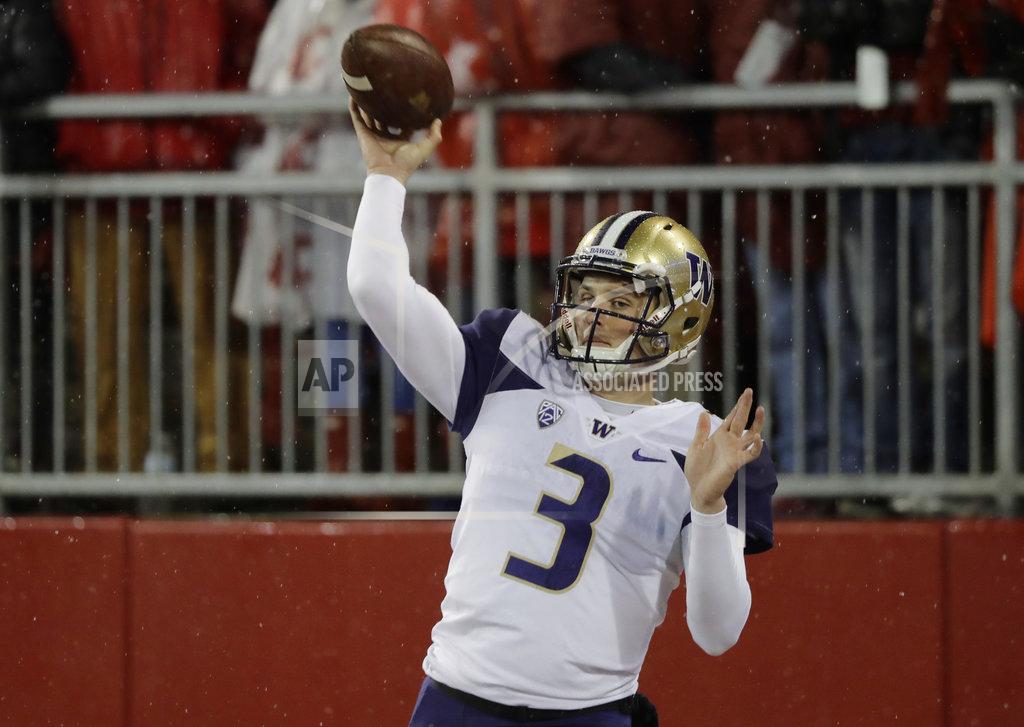 Ted S. Warren Washington quarterback Jake Browning throws during warmups before an NCAA college football game against Washington State, Friday, Nov. 23, 2018, in Pullman, Wash. (AP Photo/Ted S. Warren)