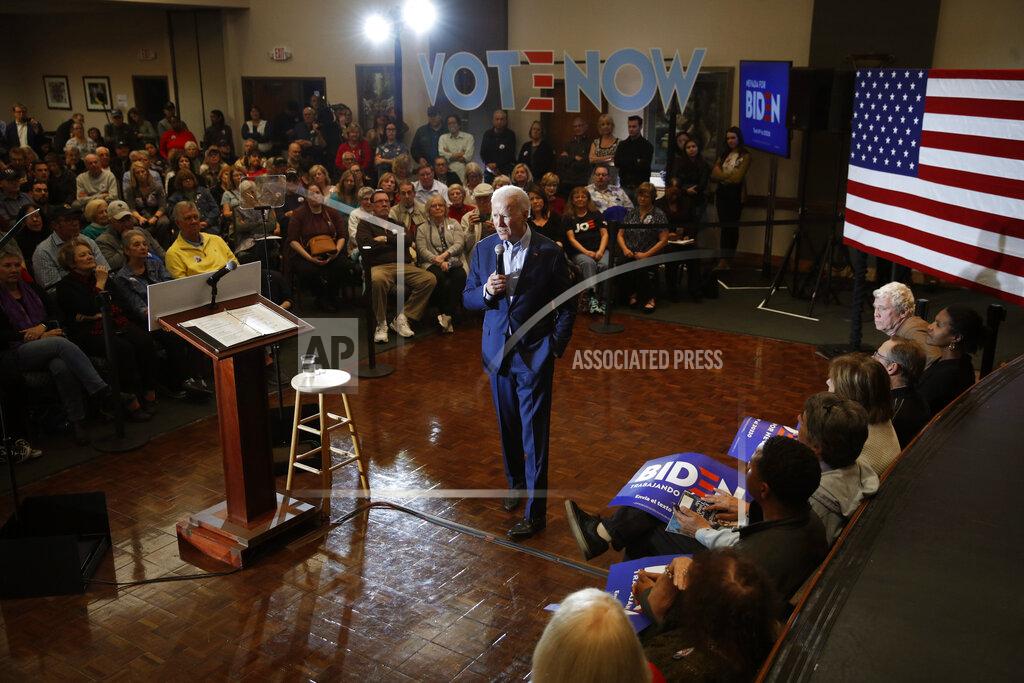 Democratic presidential candidate and former Vice President Joe Biden, center, speaks at a campaign event Friday, Feb. 14, 2020, in Henderson, Nev. (AP Photo/John Locher)