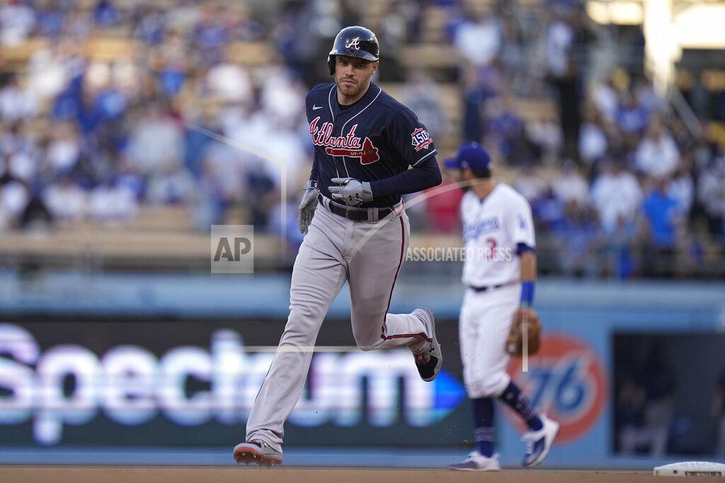 Jae C. Hong Atlanta Braves' Freddie Freeman runs the bases after hitting a two-run home run during the first inning against the Los Angeles Dodgers in Game 5 of baseball's National League Championship Series Thursday, Oct. 21, 2021, in Los Angeles. (AP Photo/Jae C. Hong)