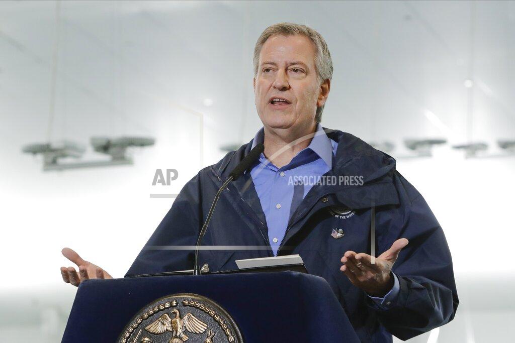 Frank Franklin Ii FILE - In this March 31, 2020 file photo, New York City Mayor Bill de Blasio speaks at the USTA Indoor Training Center where a 350-bed temporary hospital will be built in New York. De Blasio oversaw the dispersal of a large, tightly packed Hasidic Jewish funeral and lashed out at the mourners who had gathered in defiance of social distancing rules. He tweeted Tuesday, April 28, that his message to the Jewish community “and all communities” is that the time for warnings has passed. (AP Photo/Frank Franklin II, File)