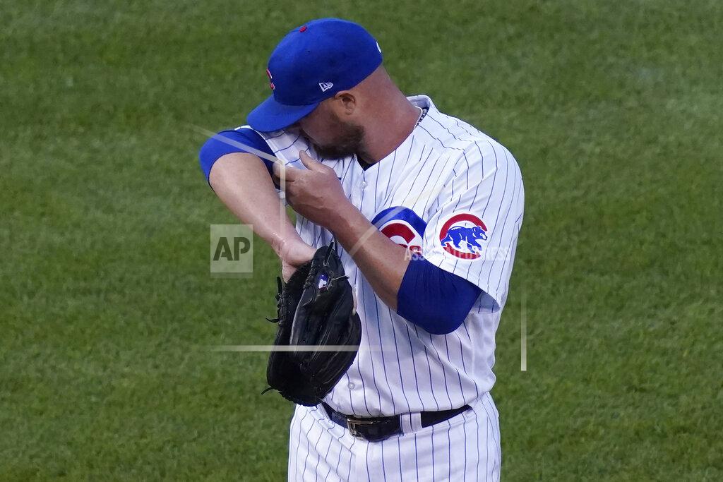 Nam Y. Huh Chicago Cubs starting pitcher Jon Lester wipes his face during the first inning of a baseball game against the St. Louis Cardinals in Chicago, Sunday, Sept. 6, 2020. (AP Photo/Nam Y. Huh)