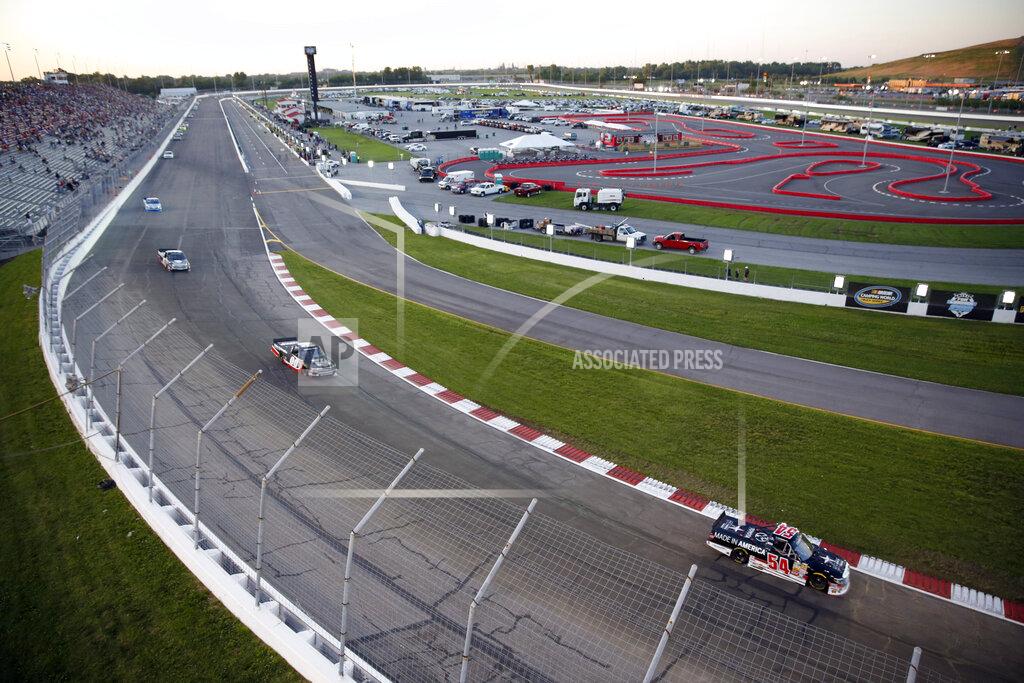 Jeff Roberson FILE - Darrell Wallace Jr. (54) leads the field during the Drivin' for Linemen 200 NASCAR Truck Series auto race at Gateway Motorsports Park Saturday, June 14, 2014, in Madison, Ill. (AP Photo/Jeff Roberson, File)