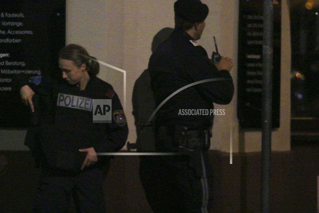 Ronald Zak Police officers stay in position at the scene after gunshots were heard, in Vienna, Monday, Nov. 2, 2020. Austrian police say several people have been injured and officers are out in force following gunfire in the capital Vienna. Initial reports that a synagogue was the target of an attack couldn't immediately be confirmed. Austrian news agency APA quoted the country's Interior Ministry saying one attacker has been killed and another could be on the run.(Photo/Ronald Zak)