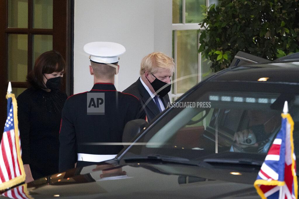 Alex Brandon British Prime Minister Boris Johnson departs after a meeting with President Joe Biden in the Oval Office of the White House, Tuesday, Sept. 21, 2021, in Washington. (AP Photo/Alex Brandon)