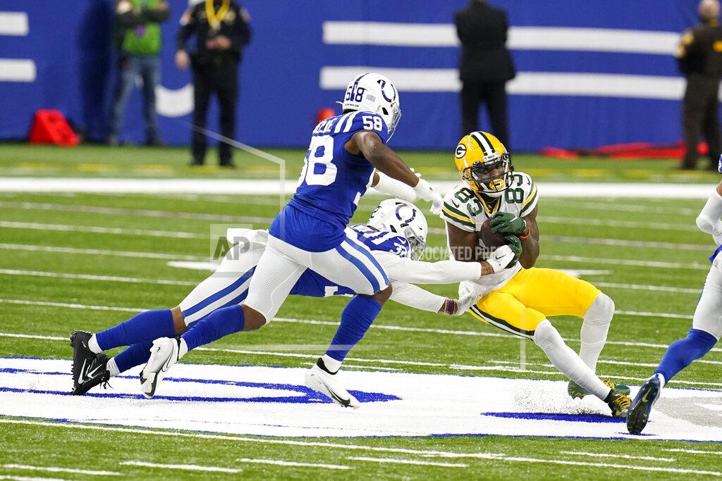 Michael Conroy Green Bay Packers' Marquez Valdes-Scantling (83) makes a catch against Indianapolis Colts' Julian Blackmon (32) during the second half of an NFL football game, Sunday, Nov. 22, 2020, in Indianapolis. (AP Photo/Michael Conroy)