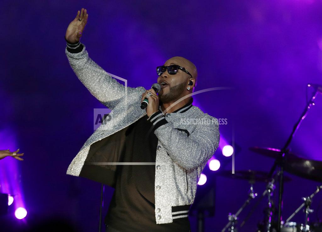 Lynne Sladky Artist Flo Rida performs during the half time show at the Orange Bowl NCAA college football game between Alabama and Oklahoma , Saturday, Dec. 29, 2018, in Miami Gardens, Fla. (AP Photo/Lynne Sladky)