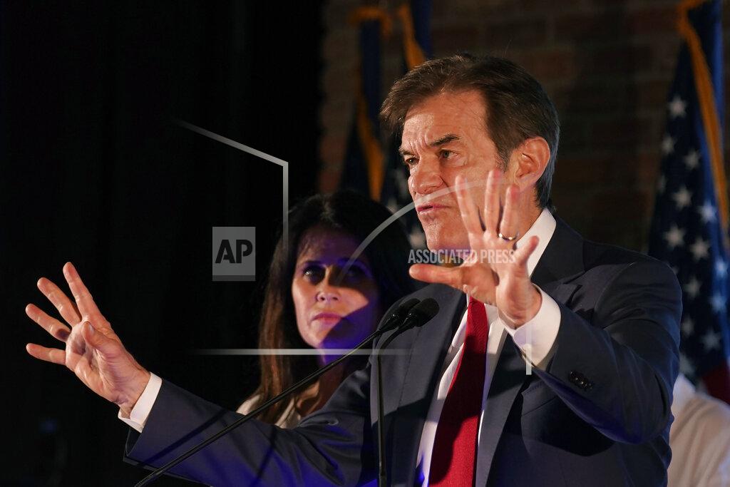 Seth Wenig Mehmet Oz, a Republican candidate for U.S. Senate in Pennsylvania, speaks to supporters at a primary night election gathering in Newtown, Pa., Tuesday, May 17, 2022. (AP Photo/Seth Wenig)