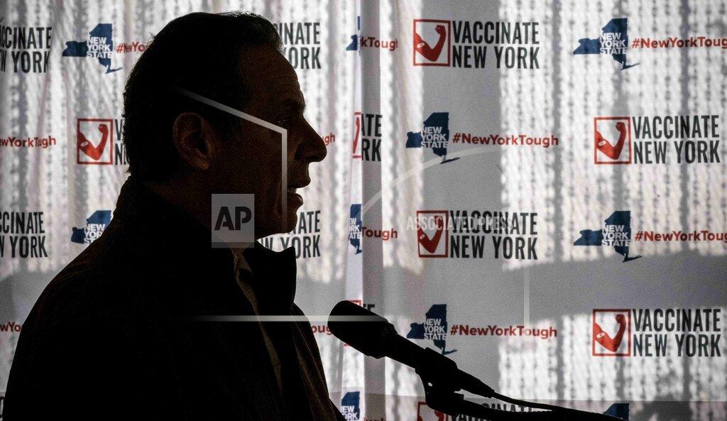 Mary Altaffer FILE - In this Saturday, Jan. 23, 2021, file photo, Gov. Andrew Cuomo speaks to reporters during a news conference at a COVID-19 pop-up vaccination site in the Brooklyn borough of New York. The Justice Department says it's decided against opening up any civil rights investigations against government-run nursing homes in New York over their COVID-19 response, in a letter to members of U.S. Congress, Friday, July 23, 2021. (AP Photo/Mary Altaffer, Pool, File)