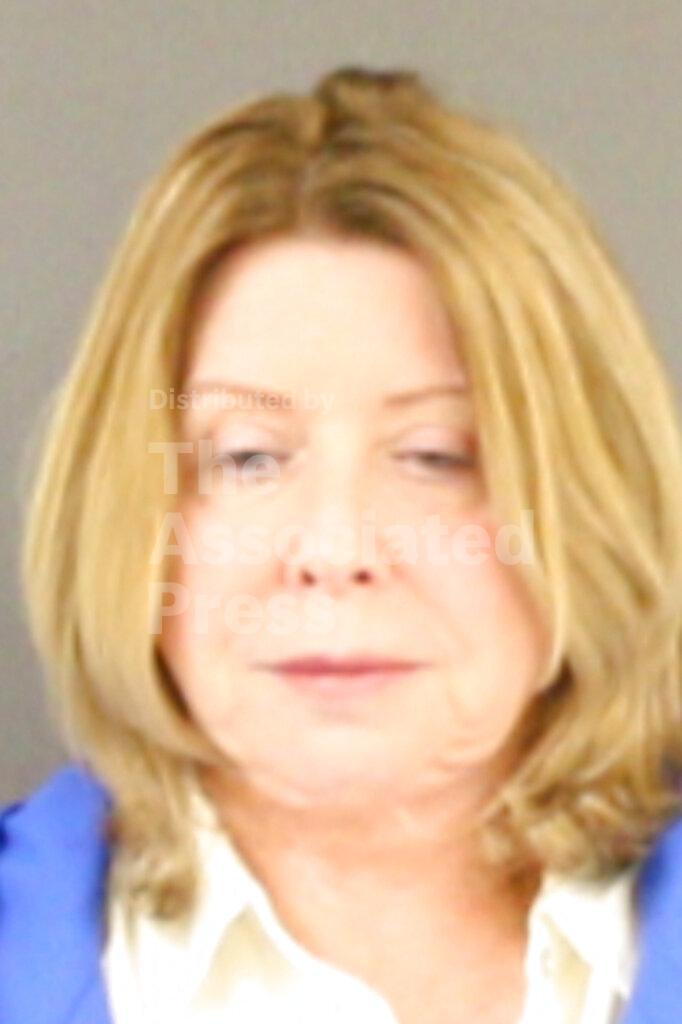 This Wednesday, Feb. 5, 2020, Hinds County Detention Center booking photograph shows Nancy New, owner and director of the Mississippi Community Education Center and New Learning Resources, in Raymond, Miss. New and five other people were indicted and arrested for allegedly embezzling millions in federal money meant for the poor through an investigation by the Mississippi State Auditor's office. (Hinds County Detention Center via AP)