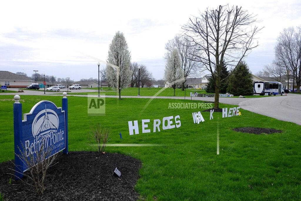 Darron Cummings A sign is displayed at the Bethany Pointe Health Campus, Saturday, April 11, 2020, in Anderson, Ind. Multiple residents at the Indiana nursing home have died from COVID-19. The new coronavirus causes mild or moderate symptoms for most people, but for some, especially older adults and people with existing health problems, it can cause more severe illness or death. (AP Photo/Darron Cummings)