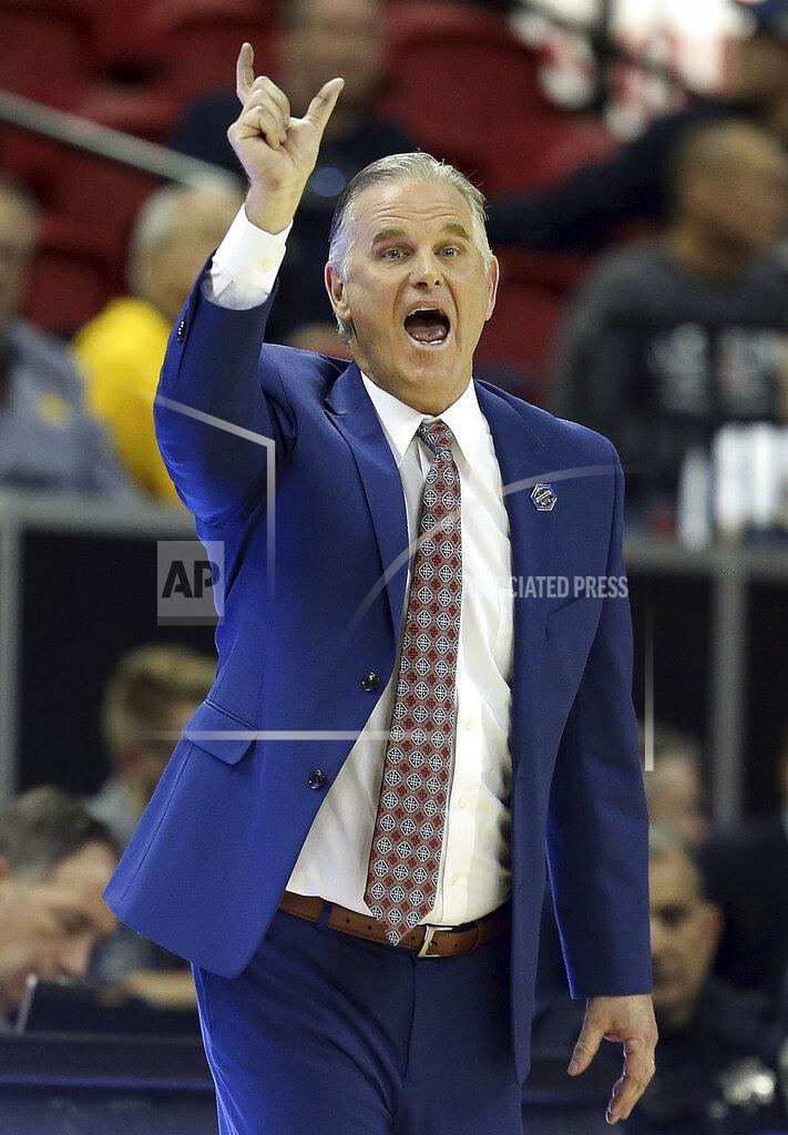Isaac Brekken San Diego State head coach Brian Dutcher instructs his team during the second half of an NCAA college basketball game against UNLV in the Mountain West Conference men's tournament Thursday, March 14, 2019, in Las Vegas. (AP Photo/Isaac Brekken)
