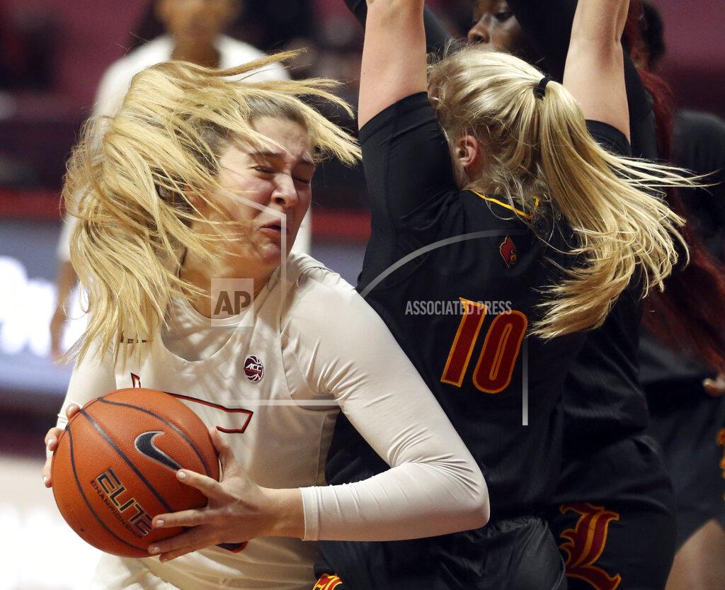 Matt Gentry Virginia Tech's Elizabeth Kitley drives on Louisville's Hailey Van Lith 10 during the first half of an NCAA college basketball game Thursday, Jan. 7, 2021, in Blacksburg, Va. (Matt Gentry/The Roanoke Times via AP, Pool)