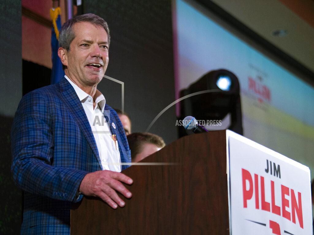 Kenneth Ferriera University of Nebraska Regent Jim Pillen smiles to applause as he is named the winner of the Nebraska Republican gubernatorial primary during an election night party at the Embassy Suites on Tuesday, May 10, 2022, in Lincoln, Neb. (Kenneth Ferriera/Lincoln Journal Star via AP)