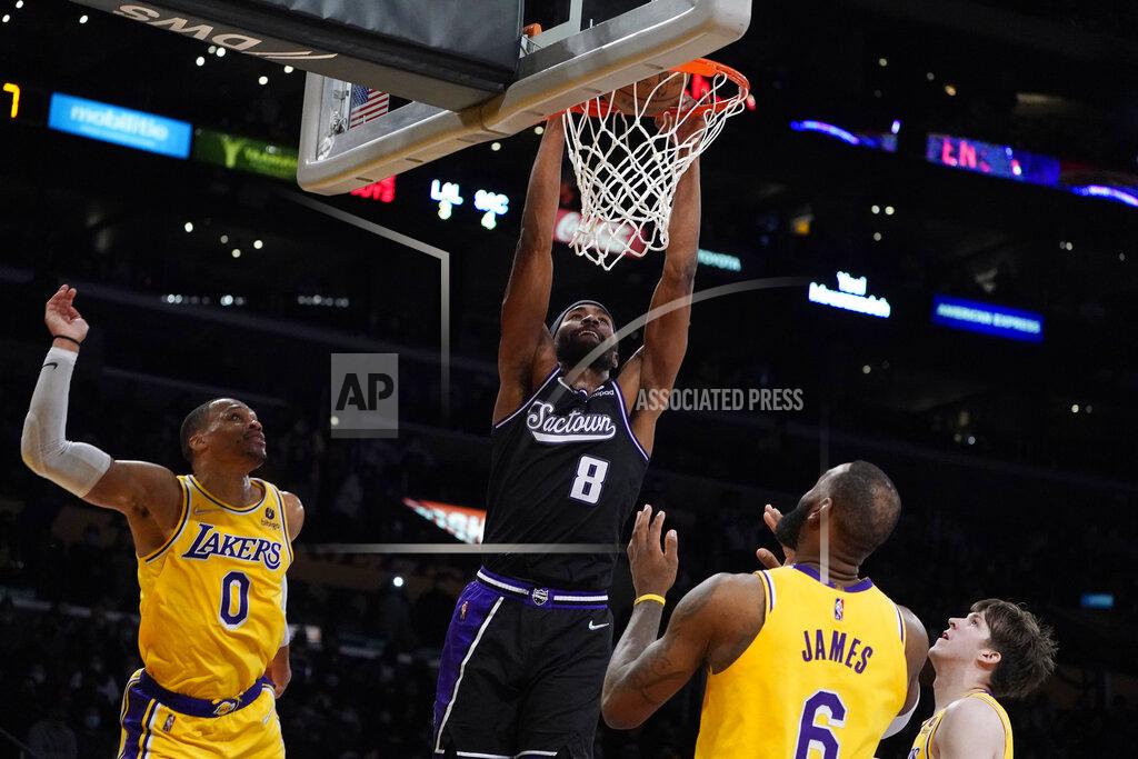 Marcio Jose Sanchez FILE - Sacramento Kings forward Maurice Harkless (8) dunks against the Los Angeles Lakers during the second half of an NBA basketball game Tuesday, Jan. 4, 2022, in Los Angeles. The Atlanta Hawks are trading Kevin Huerter to the Sacramento Kings for Justin Holiday, Mo Harkless and a future conditional draft pick, according to a person with direct knowledge of the agreement. The person spoke to The Associated Press on condition of anonymity Friday, July 1, 2022, because the trade had not been formally approved by the NBA and announced by either club. (AP Photo/Marcio Jose Sanchez, File)